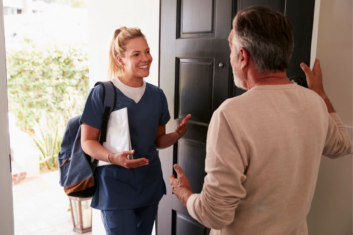 A Labs On Call phlebotomist arriving at a patient's home and being greeted at the door